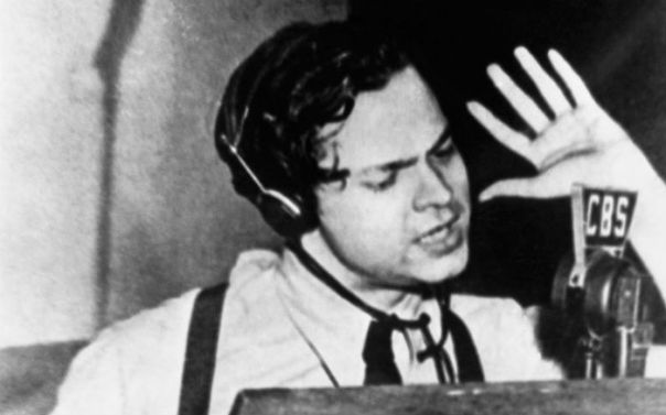 A shot of Welles during one of his radio broadcasts.